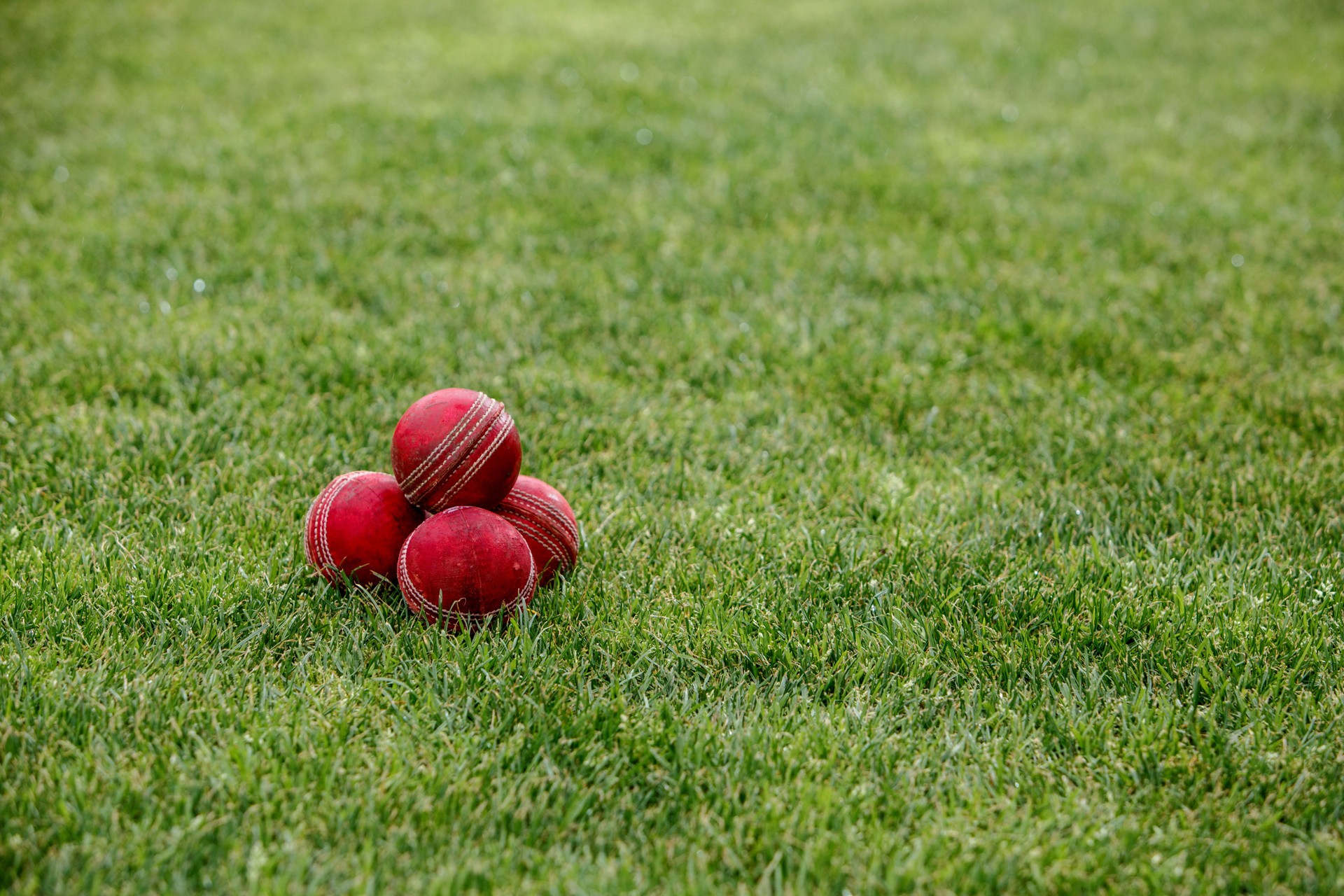 Stack Of Red Cricket Balls