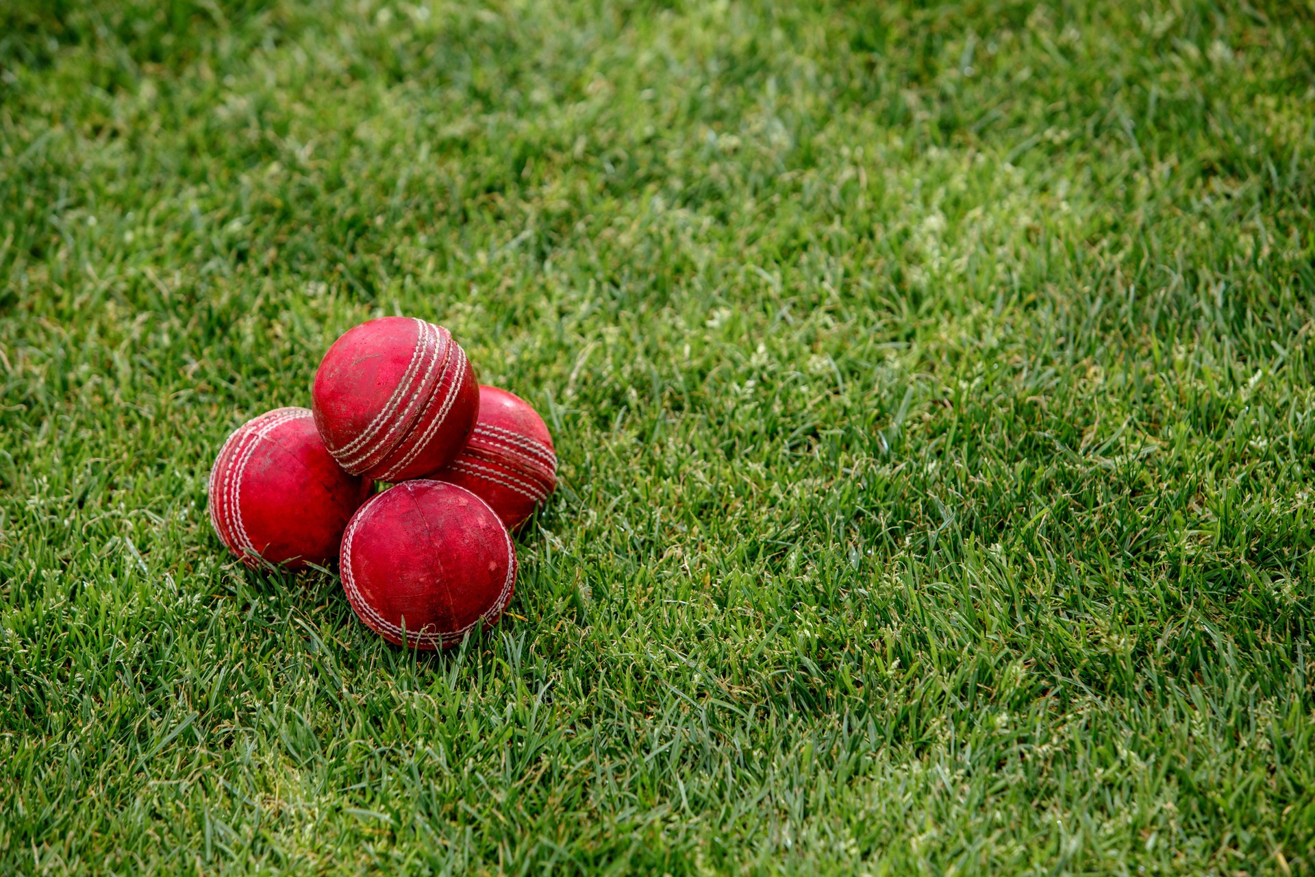 Stack Of Red Cricket Balls